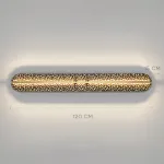 Серия светодиодных настенных светильников с удлиненным латунным корпусом и рельефной поверхностью с чернением MILIUS L120 от ImperiumLoft