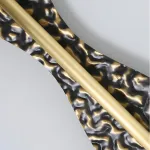 Серия светодиодных настенных светильников с латунным корпусом волнистой формы и рельефной поверхностью с чернением MILIUS WAVY L120 от ImperiumLoft