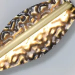 Серия светодиодных настенных светильников с латунным корпусом волнистой формы и рельефной поверхностью с чернением MILIUS WAVY L120 от ImperiumLoft