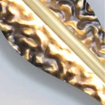 Серия светодиодных настенных светильников с латунным корпусом волнистой формы и рельефной поверхностью с чернением MILIUS WAVY L120 от ImperiumLoft