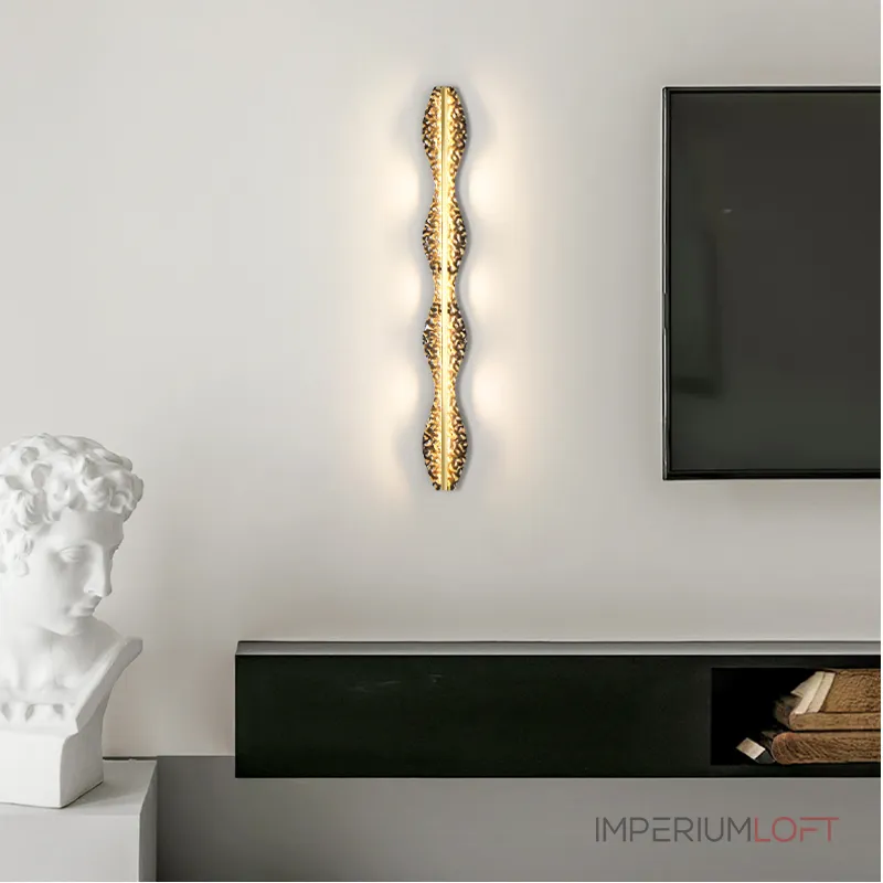 Серия светодиодных настенных светильников с латунным корпусом волнистой формы и рельефной поверхностью с чернением MILIUS WAVY L120 от ImperiumLoft Серия светодиодных настенных светильников с латунным корпусом волнистой формы и рельефной поверхностью с чернением MILIUS WAVY L120 от ImperiumLoft