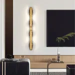 Серия светодиодных настенных светильников с латунным корпусом волнистой формы и рельефной поверхностью с чернением MILIUS WAVY L120 от ImperiumLoft