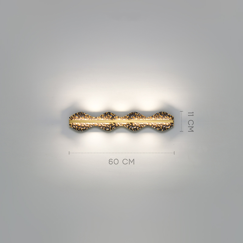 Серия светодиодных настенных светильников с латунным корпусом волнистой формы и рельефной поверхностью с чернением MILIUS WAVY L60 от ImperiumLoft