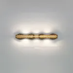 Серия светодиодных настенных светильников с латунным корпусом волнистой формы и рельефной поверхностью с чернением MILIUS WAVY L80 от ImperiumLoft