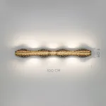 Серия светодиодных настенных светильников с латунным корпусом волнистой формы и рельефной поверхностью с чернением MILIUS WAVY L100 от ImperiumLoft