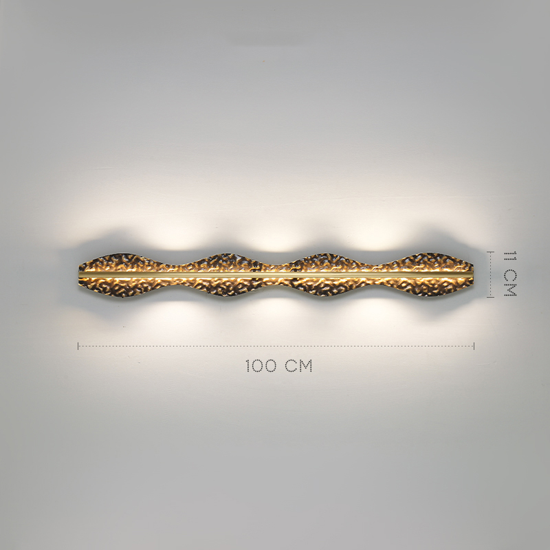 Серия светодиодных настенных светильников с латунным корпусом волнистой формы и рельефной поверхностью с чернением MILIUS WAVY L100 от ImperiumLoft