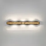 Серия светодиодных настенных светильников с латунным корпусом волнистой формы и рельефной поверхностью с чернением MILIUS WAVY L100 от ImperiumLoft