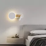 Серия настенных светильников в виде комбинации диска с LED подсветкой и поворотного спота на общем удлиненном креплении MAC Black от ImperiumLoft