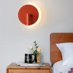 Серия разноцветных настенных светильников в виде диска с LED подсветкой по дуге и поворотным спотом DOM Green от ImperiumLoft
