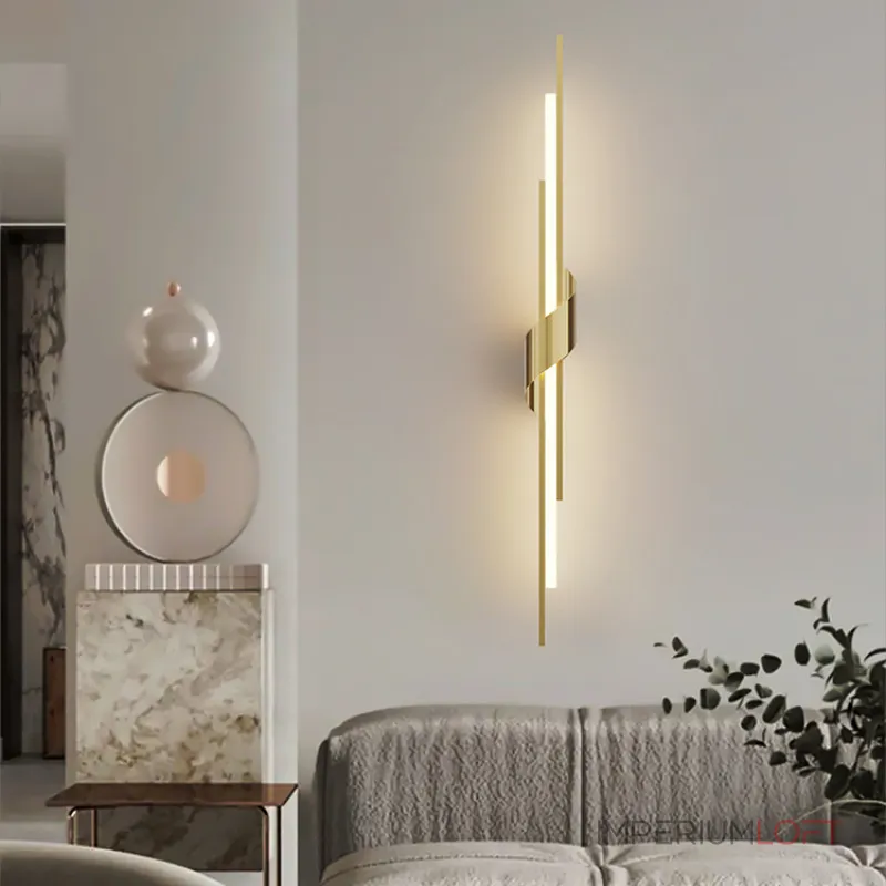 Серия настенных светодиодных светильников в виде композиции разноуровневых светящихся и металлических стержней TINUS BEND H105 Brass от ImperiumLoft