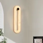 Серия светодиодных настенных светильников с кольцевидным удлиненным корпусом из мрамора FADER H40 от ImperiumLoft
