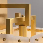 Бра с прямоугольным плафоном из мраморных пластин на кронштейне из латунных рамок ADINA MARBLE WALL от ImperiumLoft