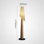 Серия торшеров с коническим корпусом из высококачественной древесины и асимметричным текстильным плафоном VALE Light Brown от ImperiumLoft