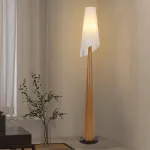 Серия торшеров с коническим корпусом из высококачественной древесины и асимметричным текстильным плафоном VALE Dark Brown от ImperiumLoft