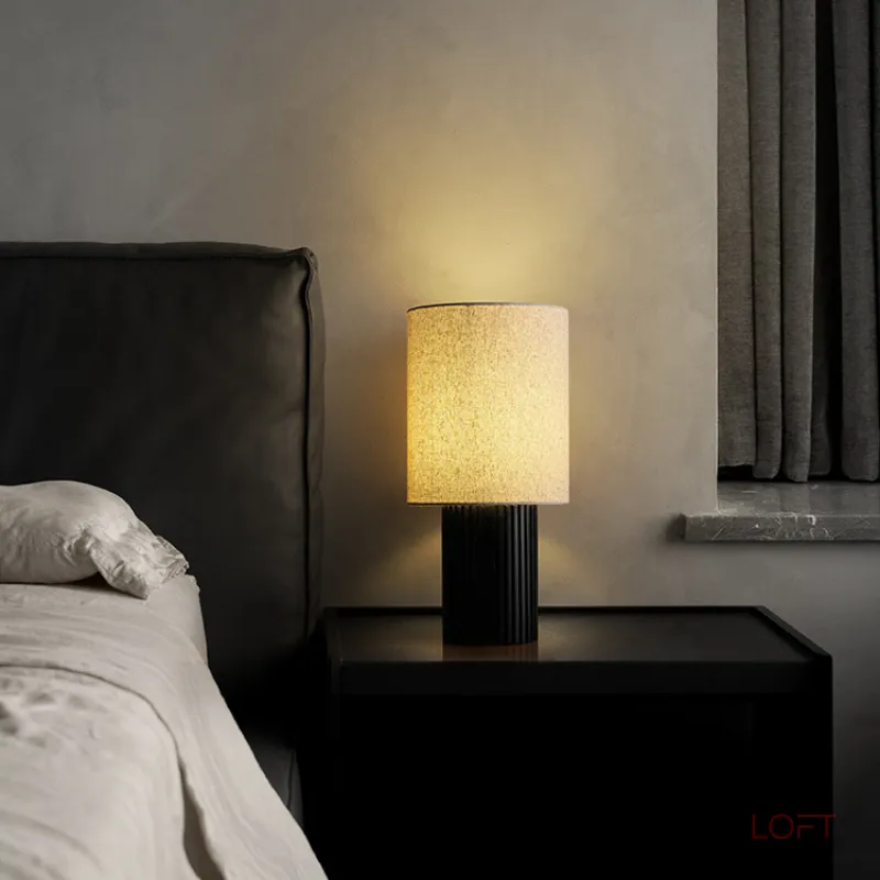 Серия настольных ламп с рельефным корпусом из высококачественной древесины разных оттенков и текстильным плафоном цилиндрической формы EUGEN Light Brown от ImperiumLoft