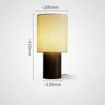 Серия настольных ламп с рельефным корпусом из высококачественной древесины разных оттенков и текстильным плафоном цилиндрической формы EUGEN Dark Brown от ImperiumLoft