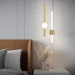 Серия светодиодных подвесных светильников в виде вертикальных стержней с шарами WAND VRT H50 L2 Brass от ImperiumLoft