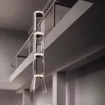 Серия подвесных светильников из прозрачных стеклянных скругленных цилиндров c LED подсветкой сверху и снизу QUENTIN A H128 от ImperiumLoft