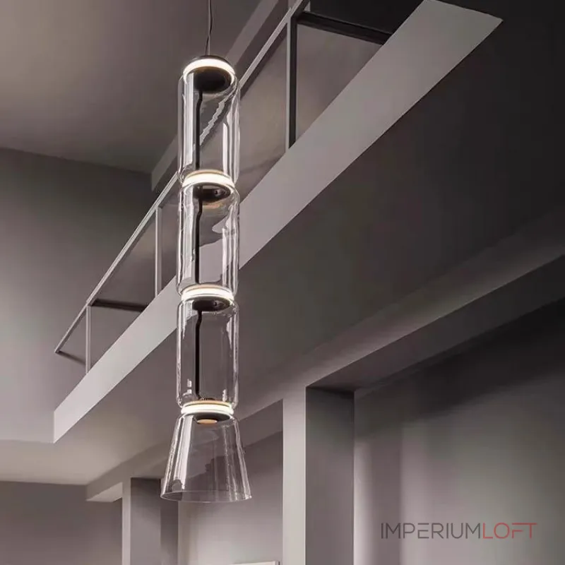 Серия подвесных светильников из прозрачных стеклянных скругленных цилиндров c LED подсветкой сверху и снизу QUENTIN A H128 от ImperiumLoft