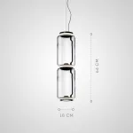 Серия подвесных светильников из прозрачных стеклянных скругленных цилиндров c LED подсветкой сверху и снизу QUENTIN A H64 от ImperiumLoft