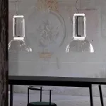 Серия подвесных светильников из прозрачных стеклянных скругленных цилиндров c LED подсветкой сверху и снизу QUENTIN A H128 от ImperiumLoft