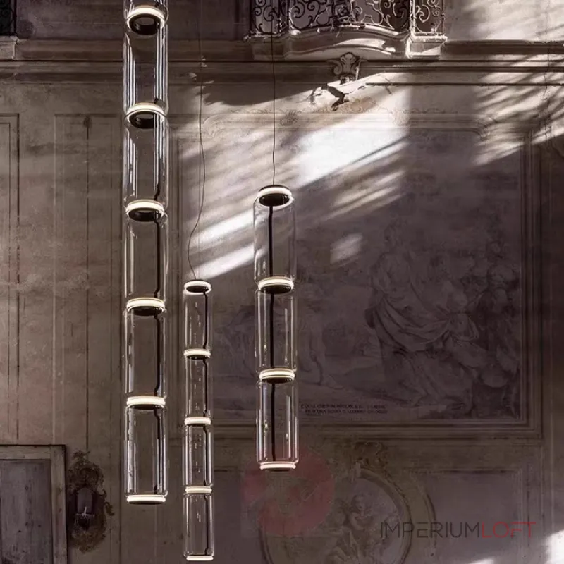 Серия подвесных светильников из прозрачных стеклянных скругленных цилиндров c LED подсветкой сверху и снизу QUENTIN A H128 от ImperiumLoft