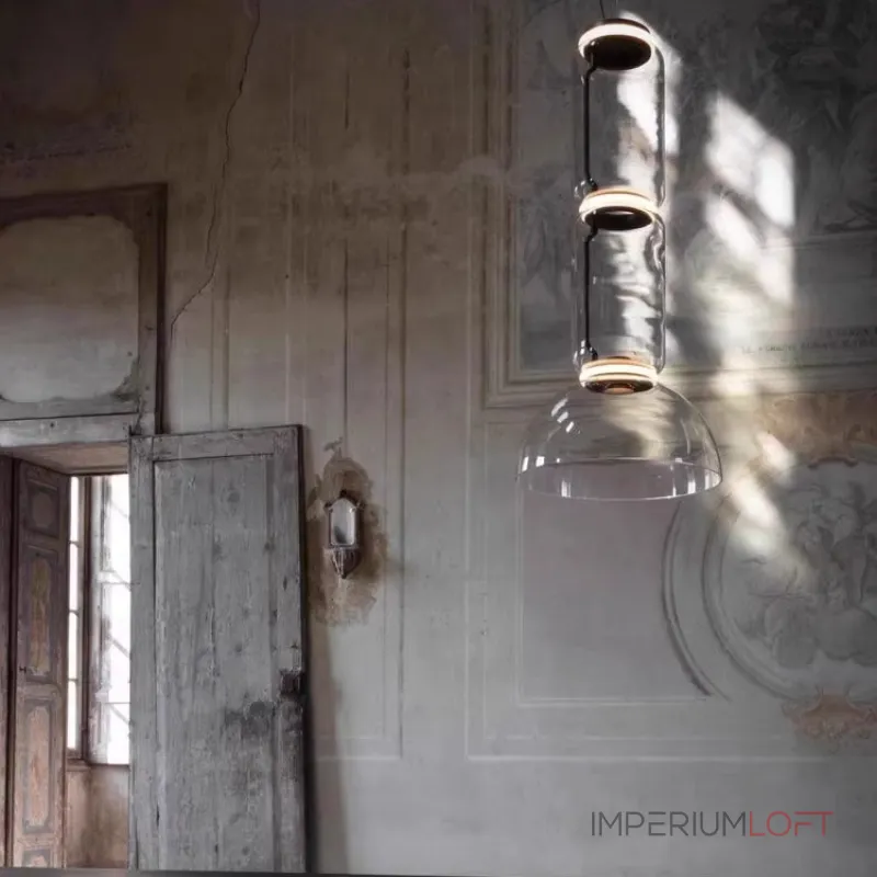 Серия подвесных светильников из прозрачных стеклянных скругленных цилиндров c LED подсветкой сверху и снизу QUENTIN A H128 от ImperiumLoft