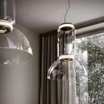 Серия подвесных светильников из прозрачных стеклянных скругленных цилиндров c LED подсветкой сверху и снизу QUENTIN A H128 от ImperiumLoft