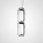 Серия подвесных светильников из прозрачных стеклянных скругленных цилиндров c LED подсветкой сверху и снизу QUENTIN A H64 от ImperiumLoft