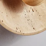 Настенный светодиодный светильник в виде вогнутого диска из натурального травертина от ImperiumLoft