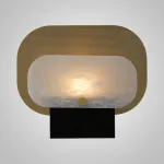 Серия настольных ламп в виде металлической перфорированной пластины и рассеивателя из натурального камня CONRAD B TAB B