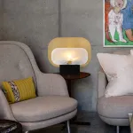 Серия настольных ламп в виде металлической перфорированной пластины и рассеивателя из натурального камня CONRAD B TAB A