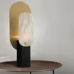 Серия настольных ламп в виде металлической перфорированной пластины и рассеивателя из натурального камня CONRAD B TAB A