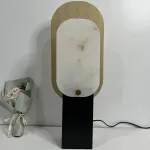 Серия настольных ламп в виде металлической перфорированной пластины и рассеивателя из натурального камня CONRAD B TAB A