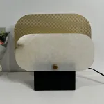 Серия настольных ламп в виде металлической перфорированной пластины и рассеивателя из натурального камня CONRAD B TAB A