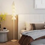 Серия минималистичных светодиодных торшеров в виде стилизованной ёлки из расположенных друг над другом конусов BAUM Green