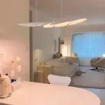 Реечный светодиодный светильник с изогнутым листовидным корпусом из металла SACHA