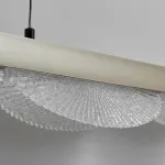 Серия реечных светильников с рельефными волнообразными рассеивателями на металлической планке AJAX A L120 от ImperiumLoft