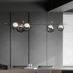 Рядный светильник с ассиметричным расположением плафонов шарообразной формы различного диаметра MAYER ORB LONG P5 от ImperiumLoft