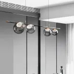 Рядный светильник с ассиметричным расположением плафонов шарообразной формы различного диаметра MAYER ORB LONG P4 от ImperiumLoft