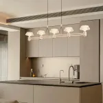 Рядный подвесной светильник с рельефными плафонами зонтичной формы и точечными источниками света на каркасе в форме лепестков из металла ASTRILD LONG от ImperiumLoft