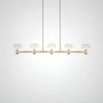 Рядный подвесной светильник с рельефными плафонами зонтичной формы и точечными источниками света на каркасе в форме лепестков из металла ASTRILD LONG от ImperiumLoft