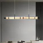 Серия реечных светильников с секциями цилиндров из стекла со спектральными переливами и внутренними рассеивателями из мрамора EVERIN LONG L110 от ImperiumLoft