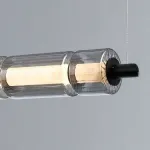 Серия реечных светильников с секциями цилиндров из стекла со спектральными переливами и внутренними рассеивателями из мрамора EVERIN LONG L110 от ImperiumLoft