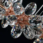 Реечный светильник с подвесками из ограненного хрусталя и рельефных стеклянных цветков EGEL B LONG