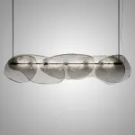 Серия светодиодных реечных светильников с двунаправленным светом и рассеивателями неправильной формы из дымчатого стекла ABEND L150 от ImperiumLoft