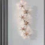 Серия настенных светильников из ограненного хрусталя в виде цветов с каркасом из металла EGEL B WALL P6 ImperiumLoft