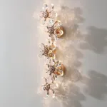 Серия настенных светильников из ограненного хрусталя в виде цветов с каркасом из металла EGEL B WALL P4 ImperiumLoft