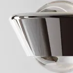 Серия настенных светильников с двунаправленным линзированным источником света на поворотном корпусе конической формы LOGE Silver ImperiumLoft