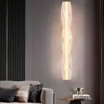 Серия настенных светильников с удлиненными рельефными рассеивателями со сглаженными краями и центральным креплением KASTEN H90 ImperiumLoft